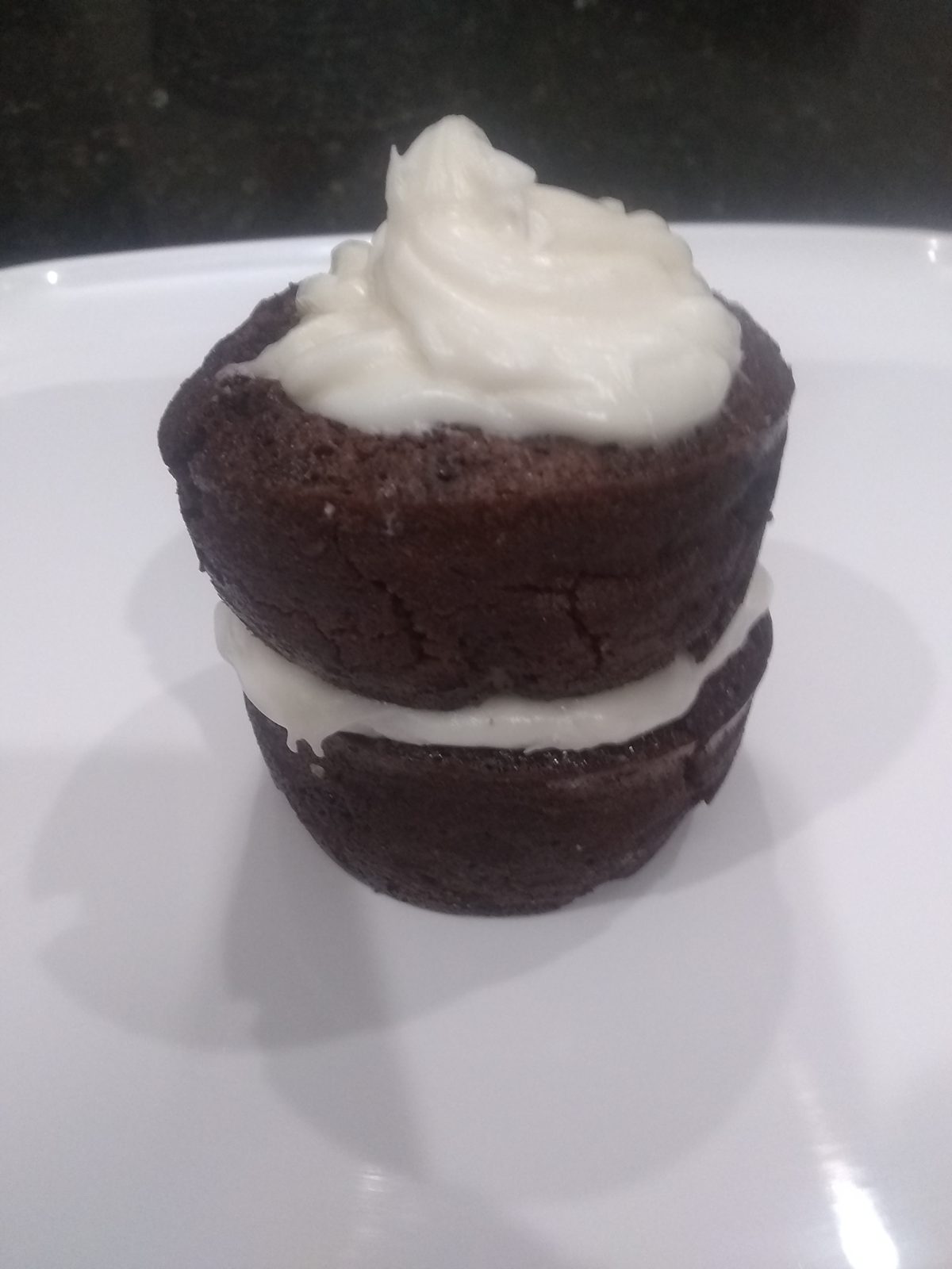 Double chocolate brownie stack with cream frosting